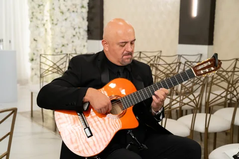 Hans playing, strings facing camera