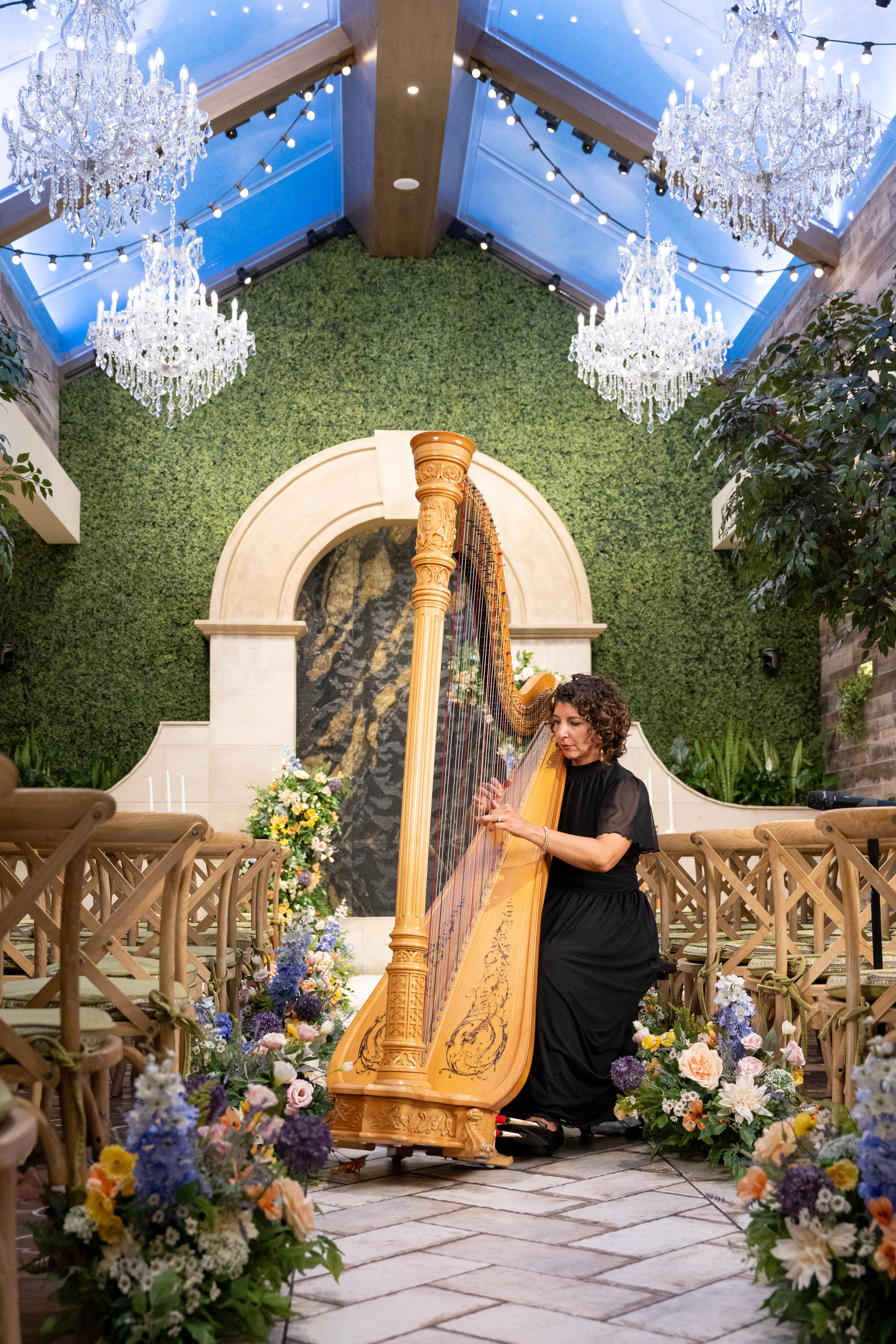 Harpist performing during the wedding celebration